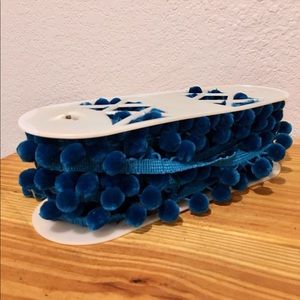 Dark blue pom pom fabric trim